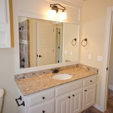 Hall Bathroom with White Cabinets