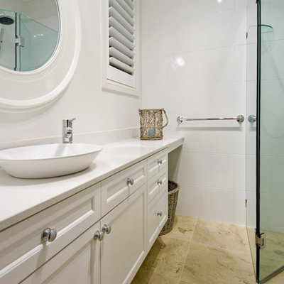 Inspiration for a mid-sized timeless white tile and subway tile mosaic tile floor freestanding bathtub remodel in Gold Coast - Tweed with recessed-panel cabinets, marble countertops and white walls