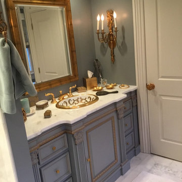 Hand crafted vanity and hand painted in a luxurious master bath