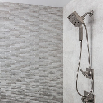 Hand Held Shower with Textured Tile Walls
