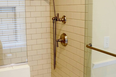 Walk-in shower - mid-sized transitional master white tile and subway tile ceramic tile walk-in shower idea in Burlington with granite countertops and beige walls