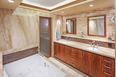 Inspiration for a large contemporary master brown tile and matchstick tile marble floor and beige floor drop-in bathtub remodel in San Diego with flat-panel cabinets, dark wood cabinets, multicolored walls, an undermount sink and marble countertops