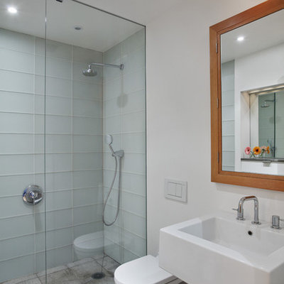 Trendy glass tile bathroom photo in New York with a wall-mount sink