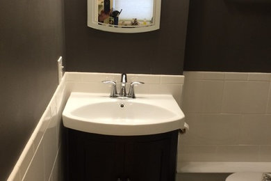 Example of a small classic 3/4 ceramic tile bathroom design in Other with a two-piece toilet, gray walls and an undermount sink