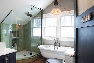 Inspiration for a mid-sized eclectic master green tile and ceramic tile medium tone wood floor bathroom remodel in Seattle with furniture-like cabinets, distressed cabinets, a one-piece toilet, gray walls, a vessel sink and marble countertops