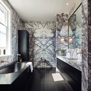 Design ideas for a mid-sized contemporary master bathroom in Melbourne with black cabinets, an undermount tub, a double shower, marble, an undermount sink, marble benchtops, black floor, a hinged shower door, flat-panel cabinets, multi-coloured tile and multi-coloured benchtops.