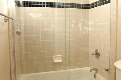 Mid-sized transitional beige tile and porcelain tile ceramic tile bathroom photo in San Diego with a two-piece toilet and beige walls