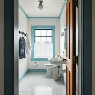 Inspiration for a country painted wood floor and gray floor bathroom remodel in New York with white walls