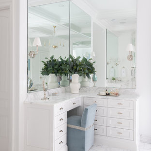 Example of a huge classic master marble floor, white floor and coffered ceiling bathroom design in Dallas with shaker cabinets, white cabinets, white walls, marble countertops, white countertops and a built-in vanity