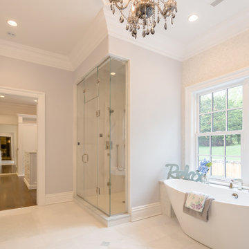 Her Master Bathroom with Shower and Bath