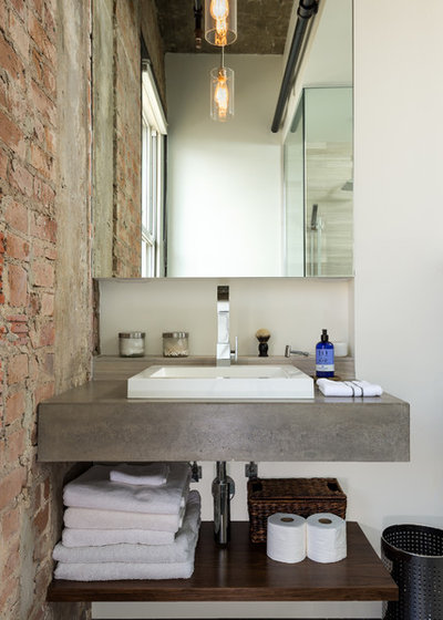 Industrial Bathroom by CONTENT Architecture
