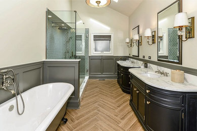 Bathroom - large transitional master multicolored tile ceramic tile bathroom idea in Chicago with black cabinets, beige walls, an undermount sink, marble countertops and furniture-like cabinets