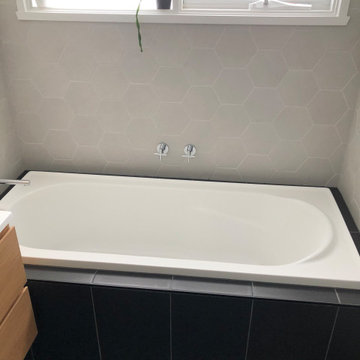 Hexagonal tiled bathroom