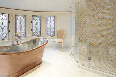 Example of a large transitional master marble tile marble floor and white floor bathroom design in New York with furniture-like cabinets, a one-piece toilet, an undermount sink, quartzite countertops, white walls and a hinged shower door