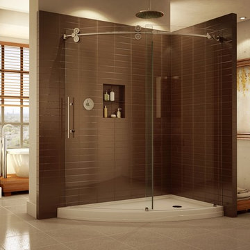 High end curved sliding shower door system with matching acrylic base