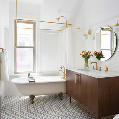 Bathroom - small traditional master white tile and subway tile gray floor bathroom idea in Denver with furniture-like cabinets, brown cabinets, white walls, marble countertops, white countertops and an undermount sink