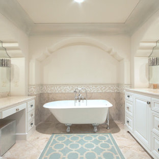 Example of a mid-sized tuscan master mosaic tile travertine floor claw-foot bathtub design in Austin with beaded inset cabinets, white cabinets, multicolored walls and quartz countertops