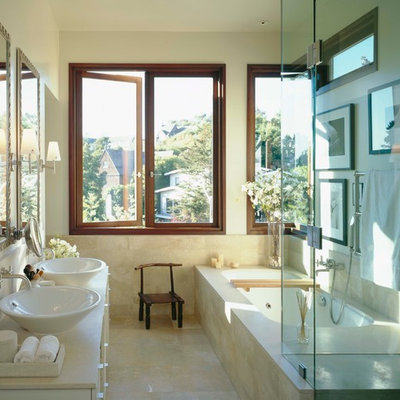 Bathroom - modern bathroom idea in San Francisco with a vessel sink and white cabinets