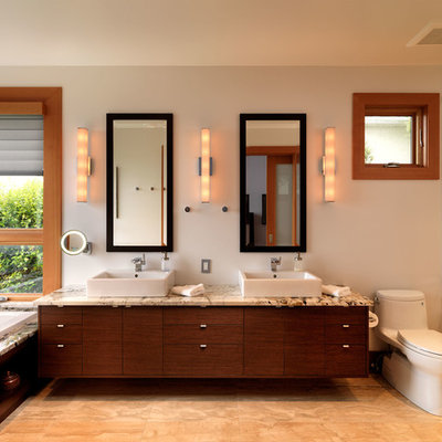 Inspiration for a contemporary bathroom remodel in Vancouver with a vessel sink