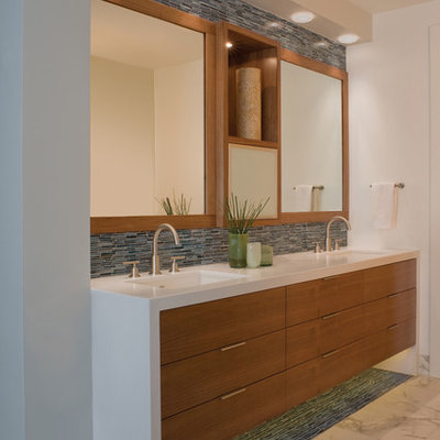 Example of a trendy blue tile and matchstick tile bathroom design in San Francisco with an undermount sink, flat-panel cabinets and medium tone wood cabinets
