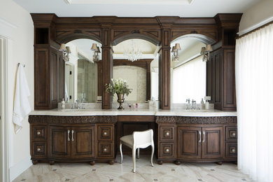 Example of a huge classic master marble floor and beige floor bathroom design in Chicago with furniture-like cabinets, dark wood cabinets, white walls, an undermount sink, quartz countertops and a hinged shower door