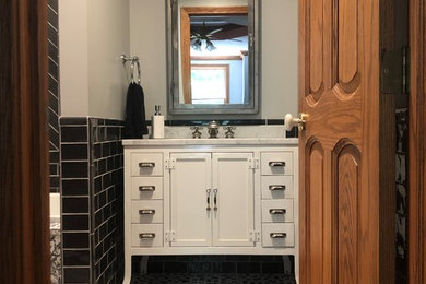 Mid-sized urban kids' black tile and subway tile porcelain tile and multicolored floor bathroom photo in Other with furniture-like cabinets, white cabinets, a one-piece toilet, gray walls, an undermount sink, marble countertops and white countertops