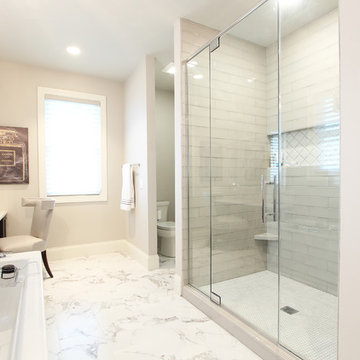 His and Hers Master Bathroom with Separate Showers and Vanity Areas
