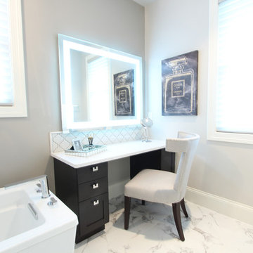 His and Hers Master Bathroom with Separate Showers and Vanity Areas