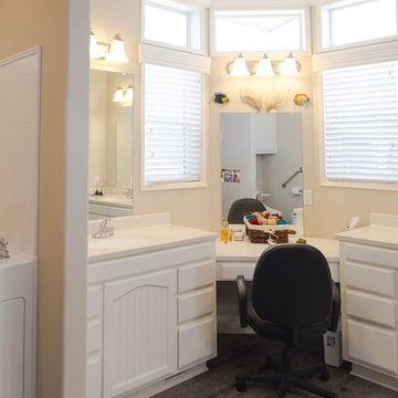 His & Hers White Master Bathroom with Makeup Area