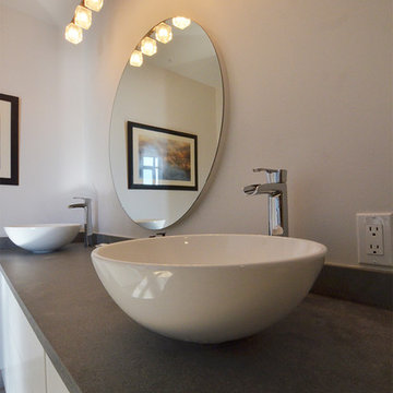 His and Hers White Vessel Sinks on Rugged Concrete Ceasarstone