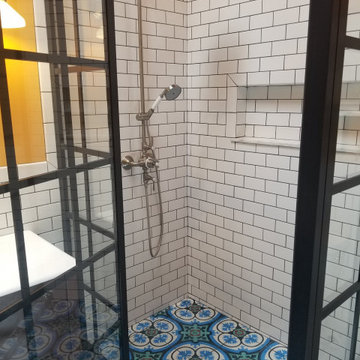 Historic bathroom using Walker Zanger tile and Gridscape shower glass by Coastal