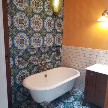 Historic bathroom using Walker Zanger tile and Gridscape shower glass by Coastal
