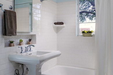 Example of a mid-sized transitional kids' white tile and porcelain tile tub/shower combo design in Phoenix with blue walls and a pedestal sink