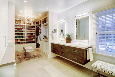 Photo of a large contemporary ensuite bathroom in Denver with flat-panel cabinets, dark wood cabinets, a corner shower, a one-piece toilet, white tiles, porcelain tiles, beige walls, porcelain flooring, an integrated sink, engineered stone worktops, grey floors, a hinged door and white worktops.