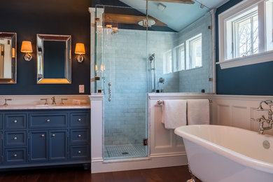 Transitional master dark wood floor bathroom photo in Boston with shaker cabinets, blue cabinets, blue walls, an undermount sink and marble countertops
