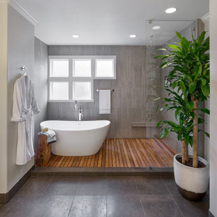 Example of a large asian master brown tile and ceramic tile bathroom design in Portland with gray walls
