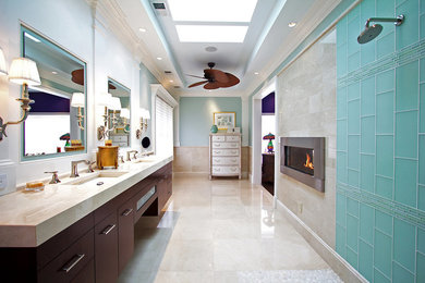 This is an example of a large traditional ensuite wet room bathroom in DC Metro with flat-panel cabinets, dark wood cabinets, blue tiles, glass tiles, white walls, marble flooring, a submerged sink, marble worktops, beige floors, an open shower and beige worktops.