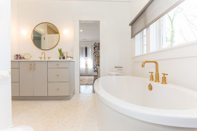 This is an example of a medium sized modern family bathroom in Charlotte with flat-panel cabinets, grey cabinets, a freestanding bath, an alcove shower, a one-piece toilet, white tiles, mosaic tiles, white walls, marble flooring, a submerged sink and quartz worktops.