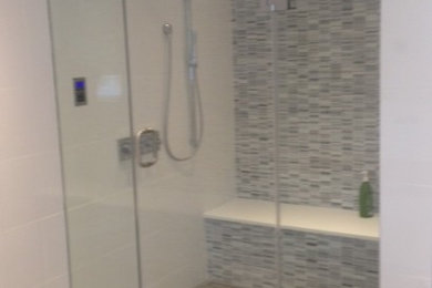Example of a classic black and white tile bathroom design in DC Metro