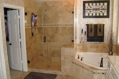 Example of a tuscan bathroom design in Dallas