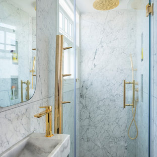 Inspiration for a small traditional bathroom in London with marble tiles, grey walls, marble flooring, a pedestal sink and white floors.