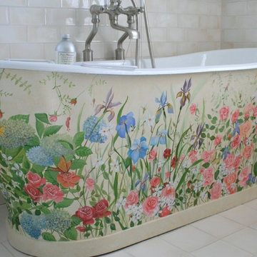Housefox Design - wild flowers painted on a freestanding bathtub.
