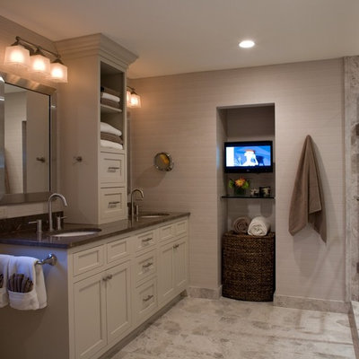 Inspiration for a timeless beige tile alcove shower remodel in DC Metro with an undermount sink, shaker cabinets and beige cabinets