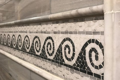 Example of a mid-sized tuscan master gray tile and stone slab marble floor double shower design in Philadelphia with gray walls