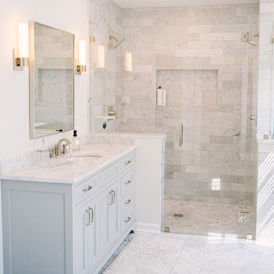 Large transitional master gray tile and marble tile marble floor and gray floor walk-in shower photo in Cincinnati with recessed-panel cabinets, gray cabinets, white walls, an undermount sink, marble countertops, a hinged shower door and gray countertops