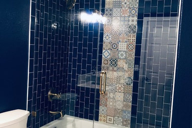 Small eclectic master blue tile and ceramic tile bathroom photo in Las Vegas with a hinged shower door