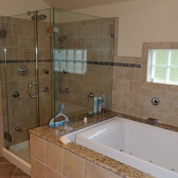 Integrated tub deck and shower stall