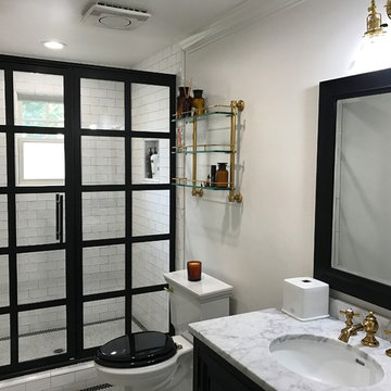 Interior alabaster white wall, a white trim, black vanity