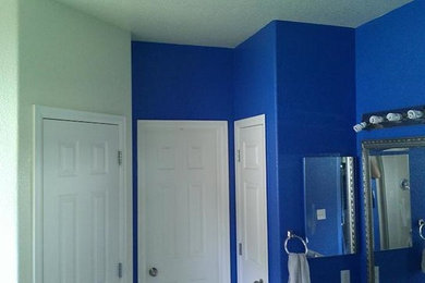 Inspiration for a bathroom remodel in Denver with blue walls