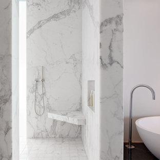 Shower bench - modern marble tile shower bench idea in San Francisco with a niche